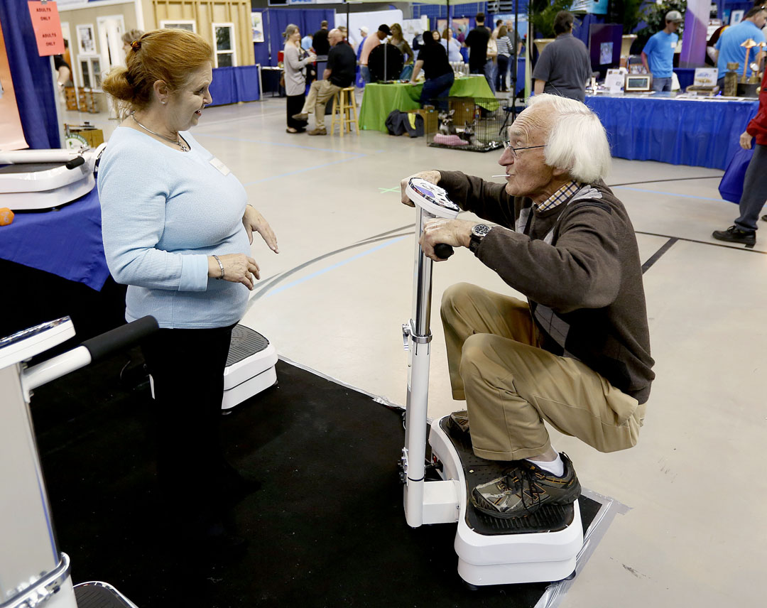 Dan Spangler tests out the Euro Body Shaper during the North Central Florida Home & Garden Show at the Stephen C. O'Connell Center on Saturday, March 7, 2015 in Gainesville, Fla. The show continues Sunday from 11 a.m. to 5 p.m.(Matt Stamey/Staff photographer)