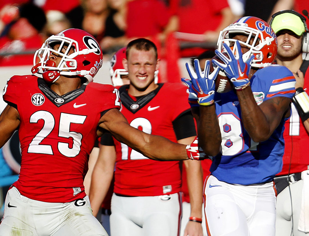 Florida Gators wide receiver Antonio Callaway (81) catches a pass in front of Georgia Bulldogs safety Johnathan Abram (25) and runs for a touchdown during the first half at Everbank Field on Saturday, Oct. 31, 2015 in Jacksonville, Fla. Florida defeated Georgia. Matt Stamey/Staff photographer