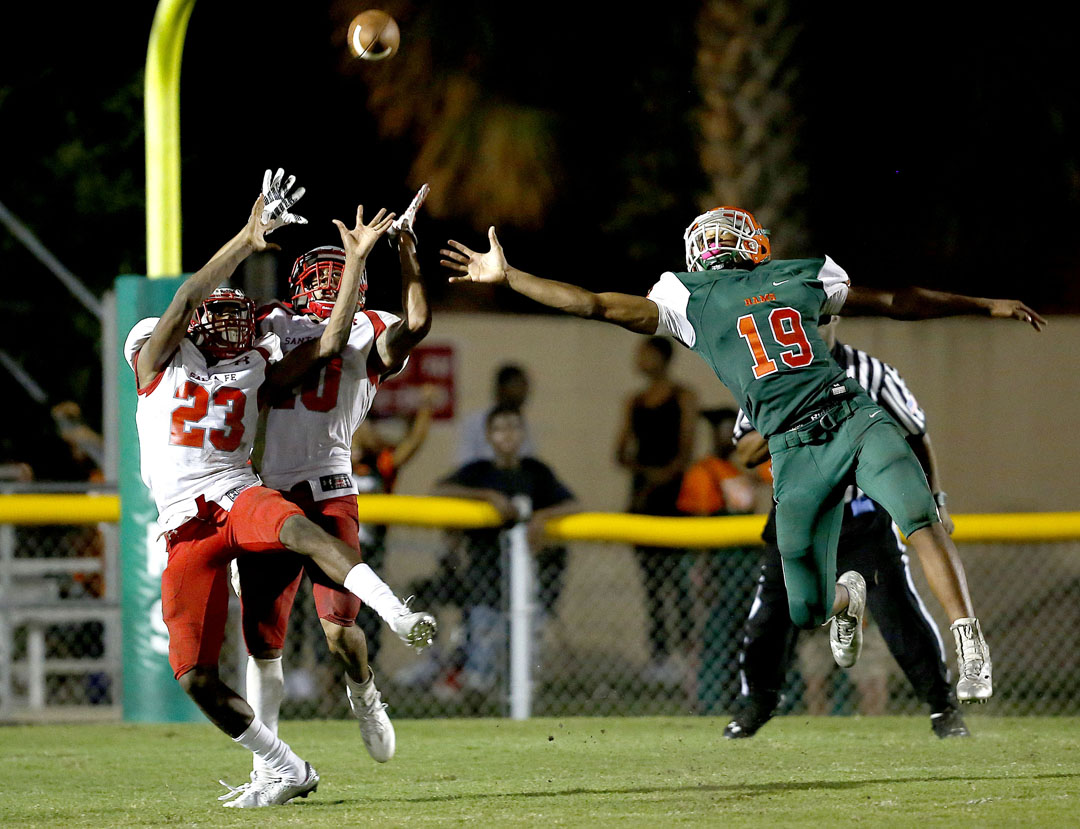 Santa Fe Raiders safety Isaiah Cromarty (10) intercepts a pass intended for Eastside Rams receiver Anthony Richardson on Friday, Sept. 9, 2016 in Gainesville, FL. Santa Fe defeated Eastside 24-20. Matt Stamey/Gainesville Sun