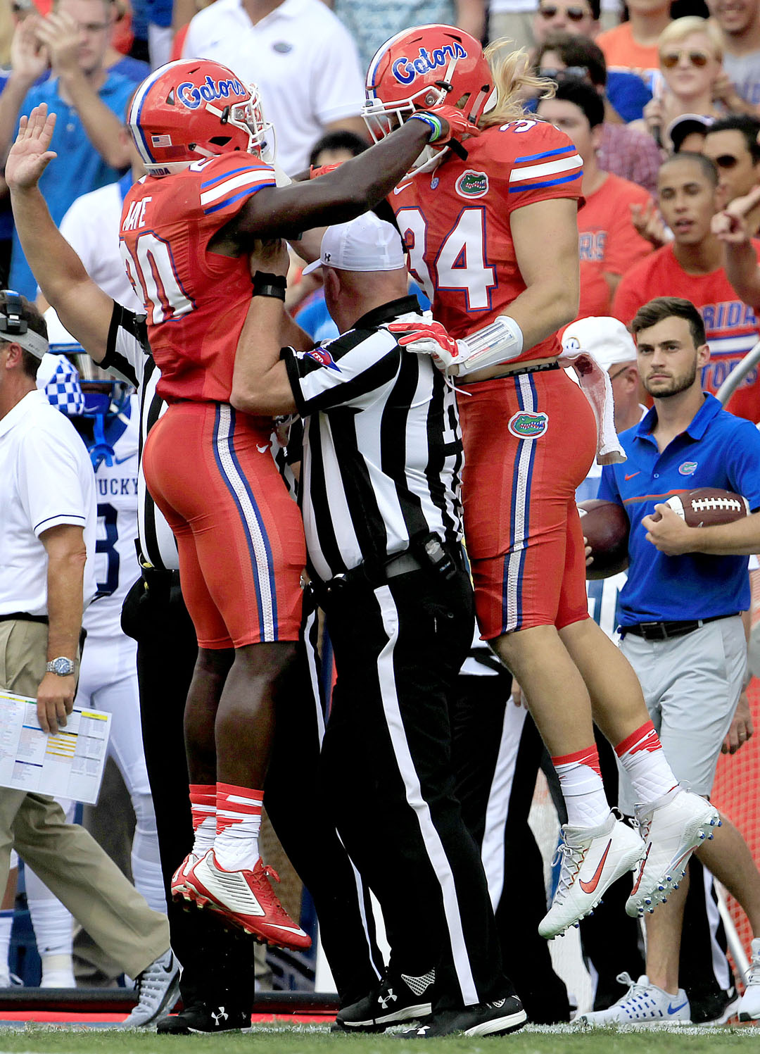 Florida Gators defensive back Marcus Maye (20) and linebacker Alex Anzalone (34) celebrate around a referee against the Kentucky Wildcats during the first half at Steve Spurrier Florida Field at Ben Hill Griffin Stadium on Saturday, Sept. 10, 2016 in Gainesville, FL. Florida defeated Kentucky 45-7. Matt Stamey/Gainesville Sun