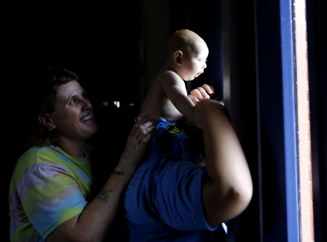 Six month old Alex looks out of a window at Mason Elementary during Hurricane Matthew on Thursday, Oct. 6, 2016 in St. Augustine, FL. Matt Stamey/Gainesville Sun