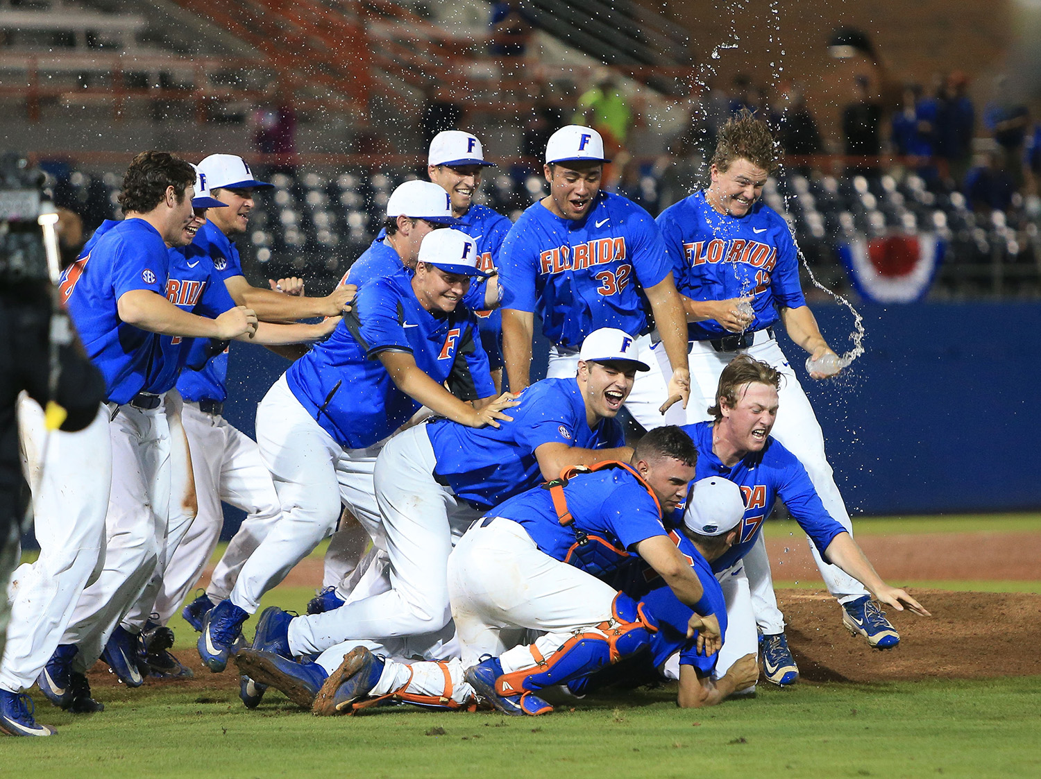 Florida players celebrate after defeating Wake Forest 3-0 in an NCAA college super regional baseball game Monday, June 12, 2017, in Gainesville, Fla. (AP Photo/Matt Stamey)