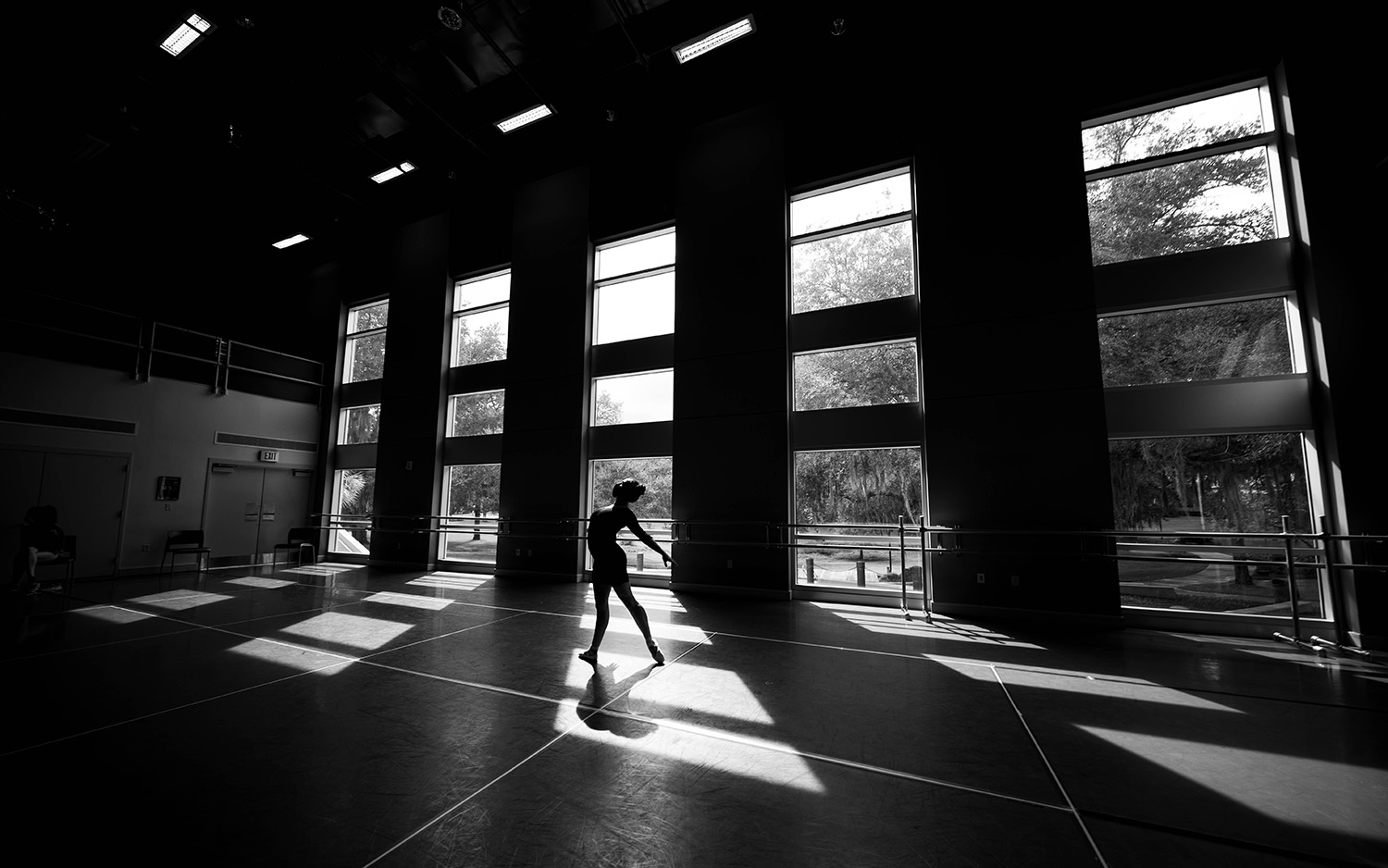 Students in the Santa Fe College dance program during a class on Sept. 16, 2020 Dancers were spaced out via taped squares on the floor and required to wear masks. (Matt Stamey/Santa Fe College ) ***Subjects Have Releases***