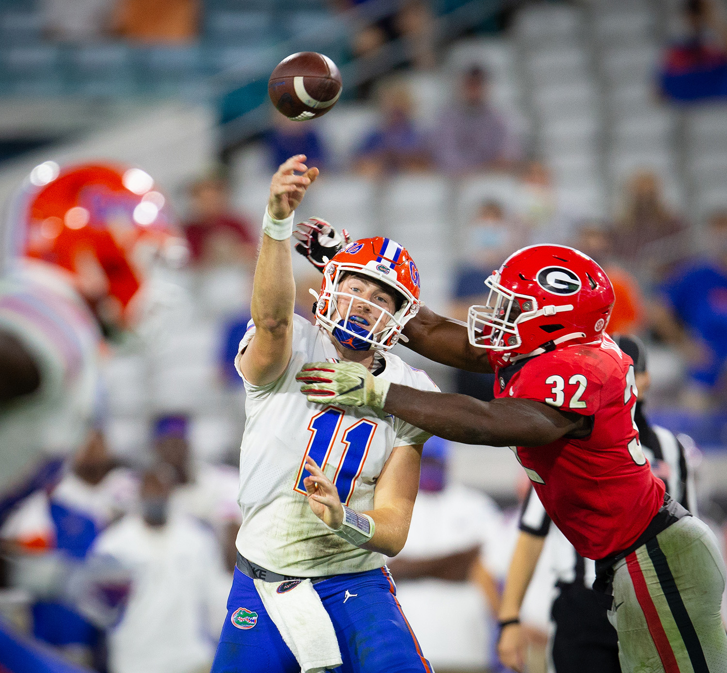 Florida Gators quarterback Kyle Trask (11) Georgia Bulldogs linebacker Monty Rice (32) at TIAA Bank Field in Jacksonville, Florida on Saturday, Oct. 7, 2020. (photo by Matt Stamey)