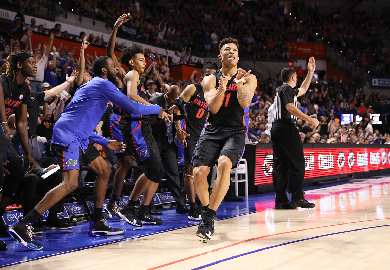 Florida forward Keyontae Johnson (11) celebrates after making a three point shot against Auburn during the second half of an NCAA college basketball game Saturday, Jan. 18, 2020, in Gainesville, Fla. (AP Photo/Matt Stamey)