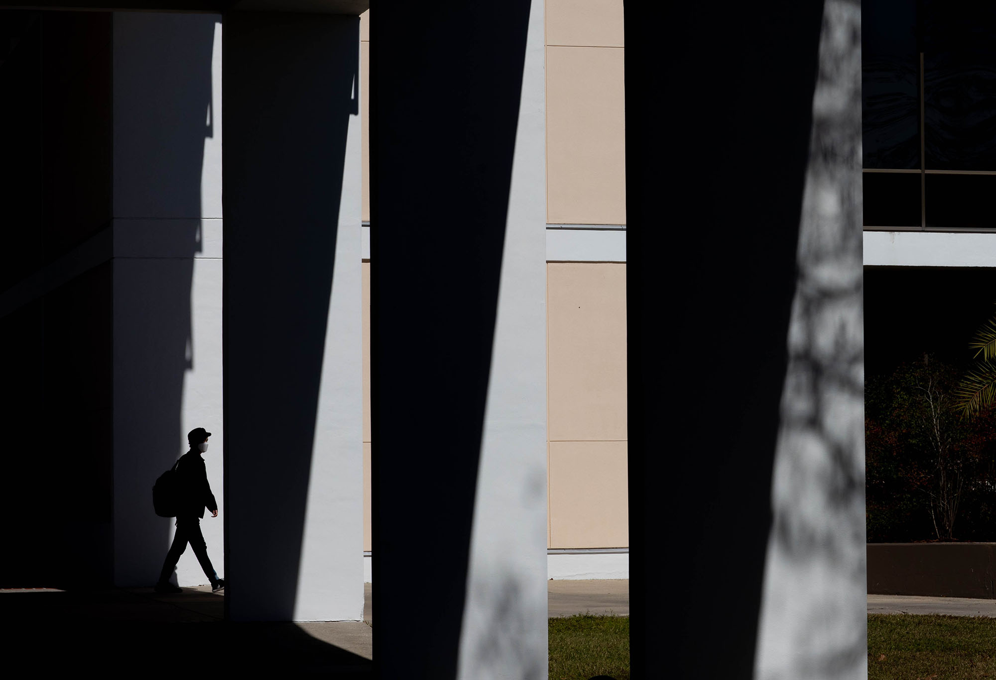 Santa Fe College student walks past Building A on Feb. 3, 2021. (Matt Stamey /Santa Fe College ) ***Subjects Have Releases***