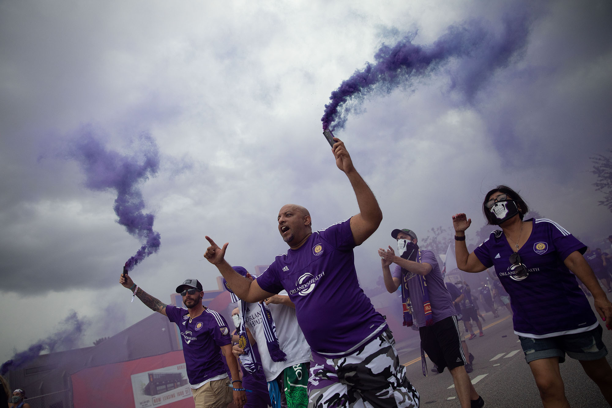 Aug 21, 2021; Orlando, Florida, USA; Orlando City fans march to Orlando City Stadium before the match against the Chicago Fire. Mandatory Credit: Matt Stamey-USA TODAY Sports