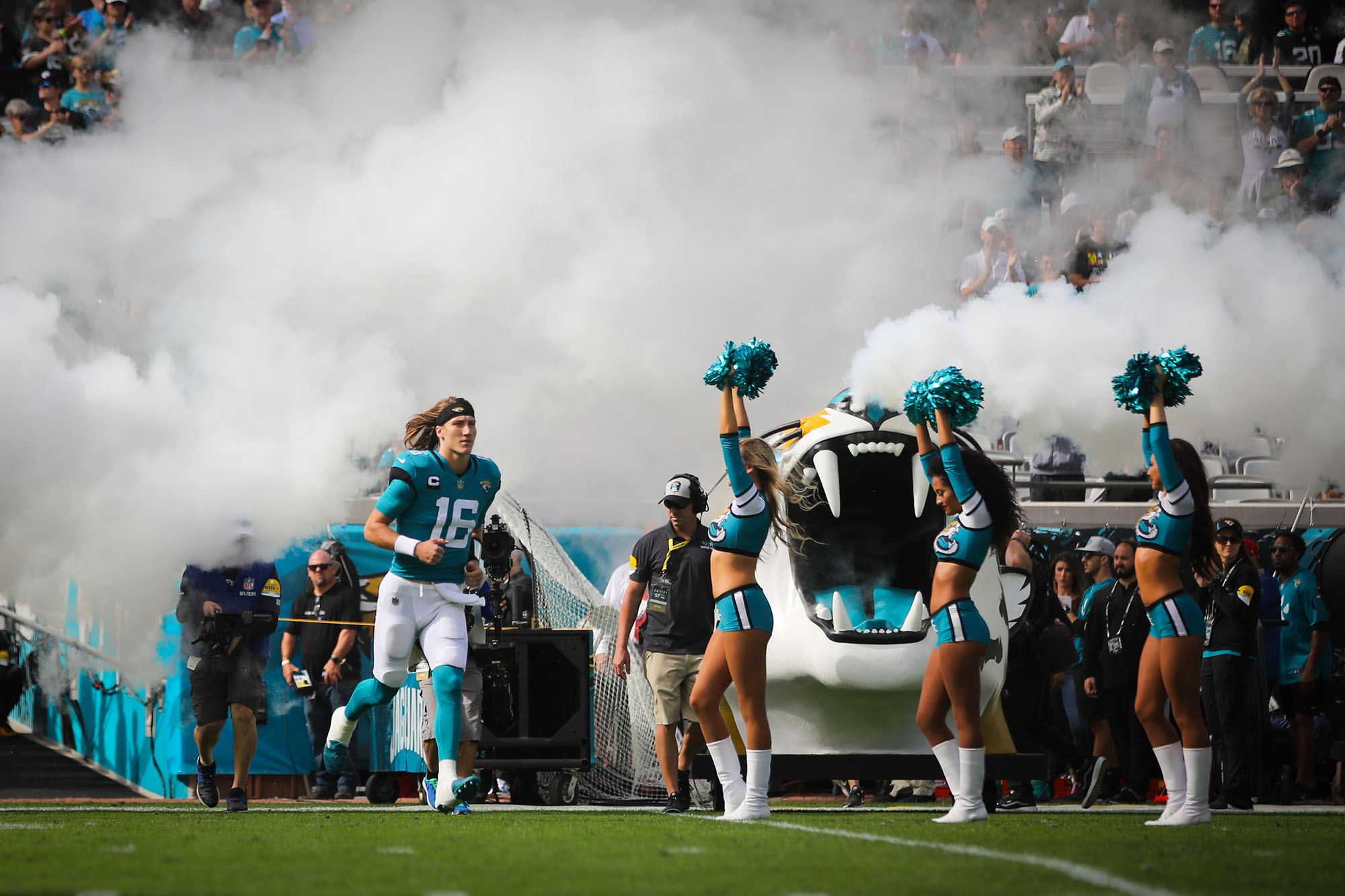 Jacksonville Jaguars quarterback Trevor Lawrence (16) takes the field during introductions before the first half of an NFL football game against the San Francisco 49ers, Sunday, Nov. 21, 2021, in Jacksonville, Fla. (AP Photo/Matt Stamey)