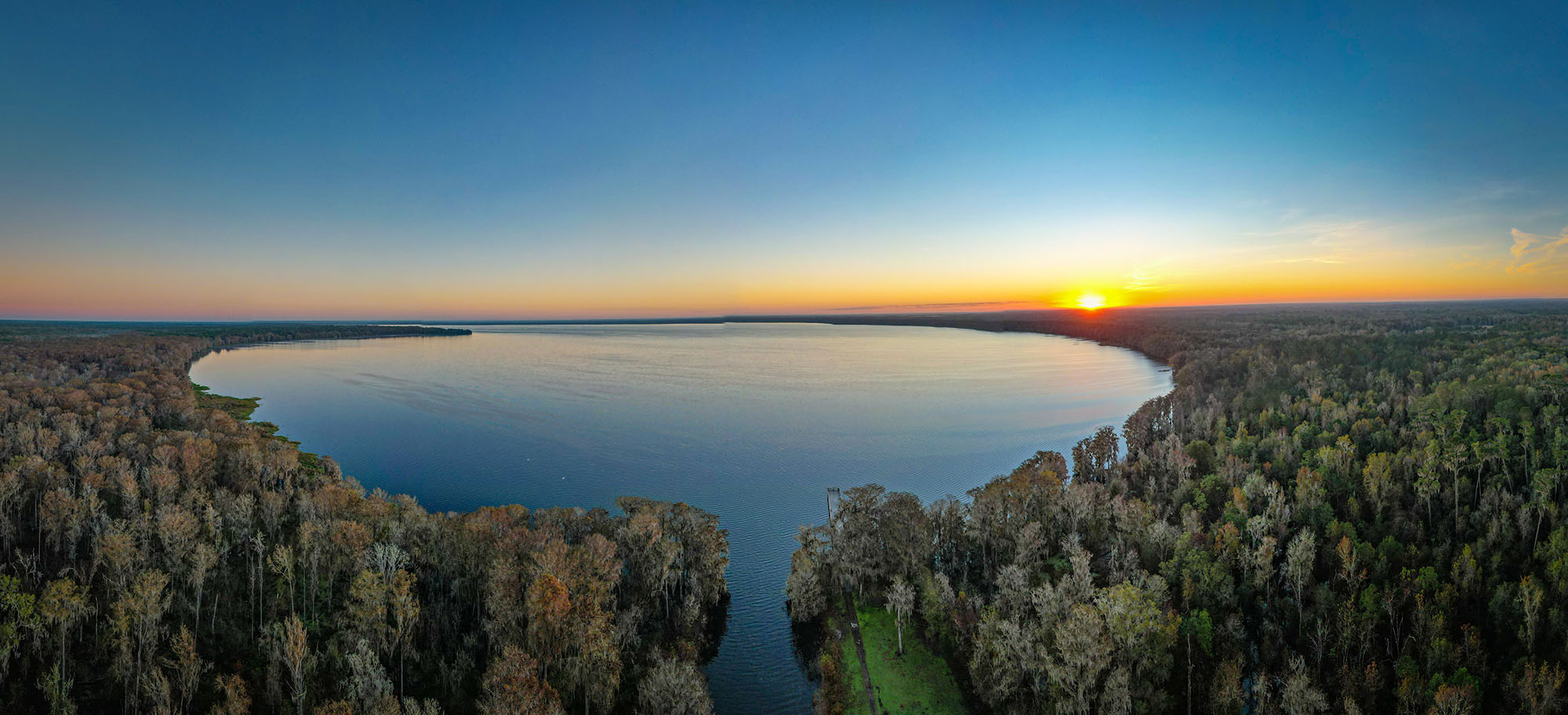 Christmas Eve Sunrise on Nunans Lake on Thursday, Dec. 24, 2021 in Gainesville, Florida. (Photo by Matt Stamey)