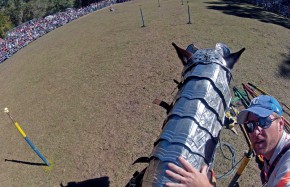 Setting up a camera on a jouster's helmet. 